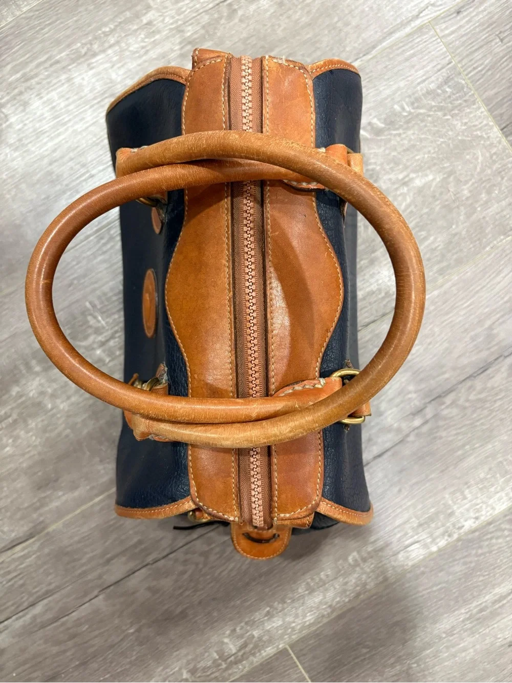 Dooney & Bourke Navy and Tan Pebbled Leather Doctor Bag